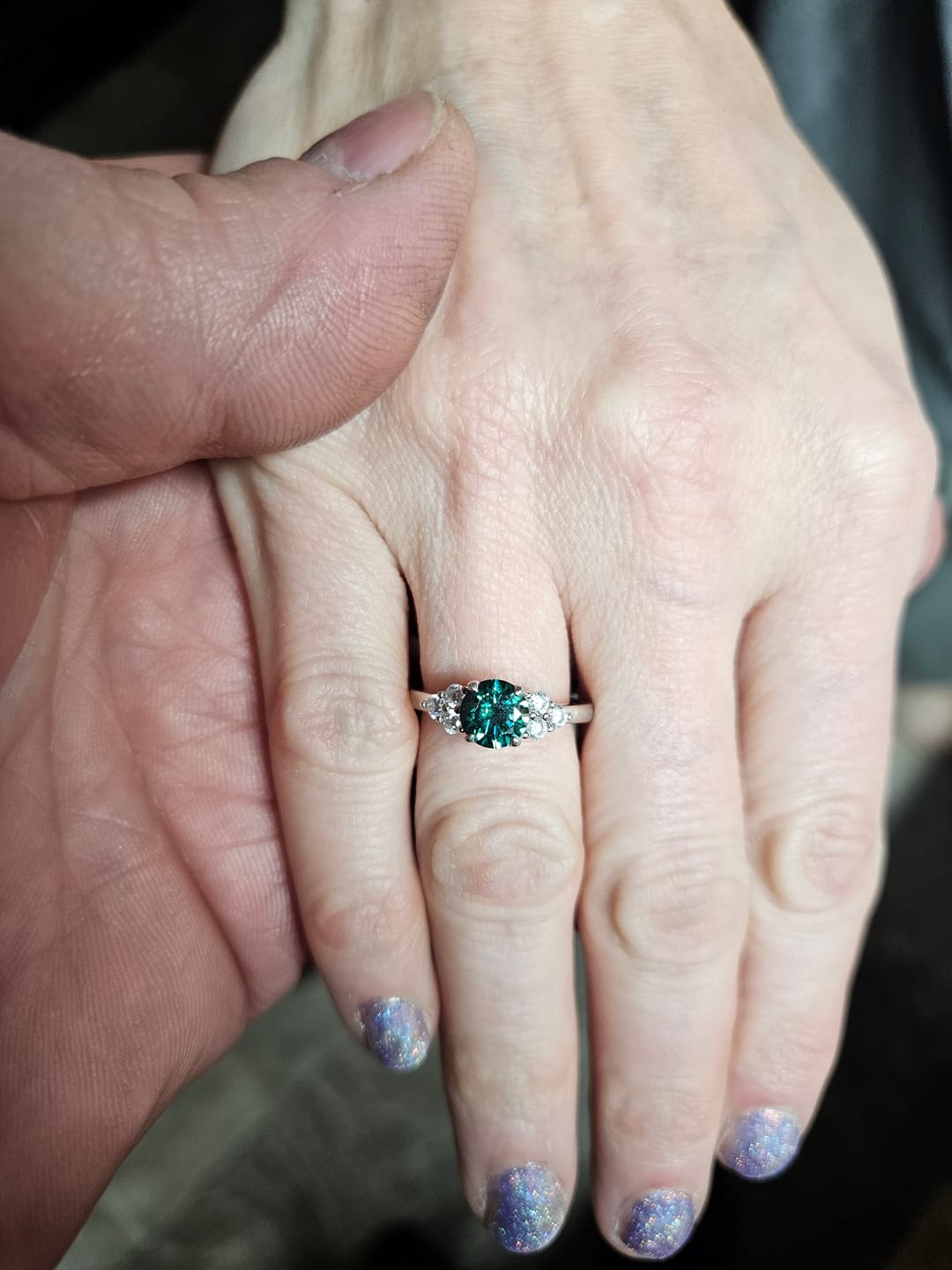 Customer photo review of Green Moissanite Side Stone Engagement Ring