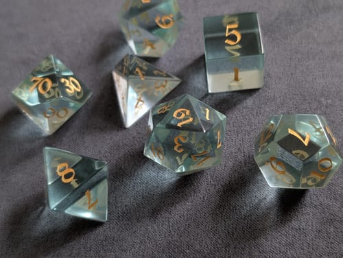 Customer photo review of Green Water Glass Hand Carved DND Dice Set