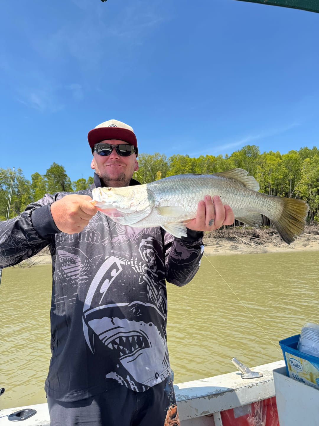 Customer photo review of DEATH & TAXES Fishing Jersey