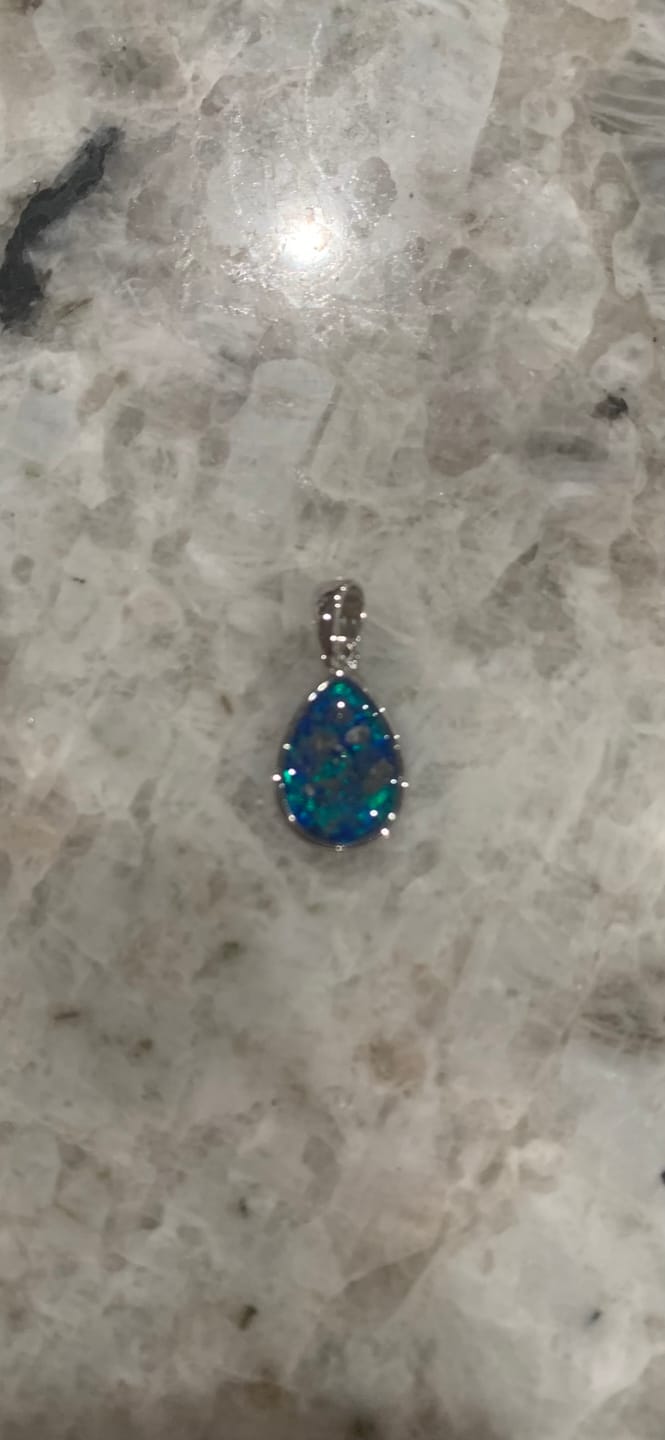 Customer photo review of Petite Pear Drop with Cremation Ashes