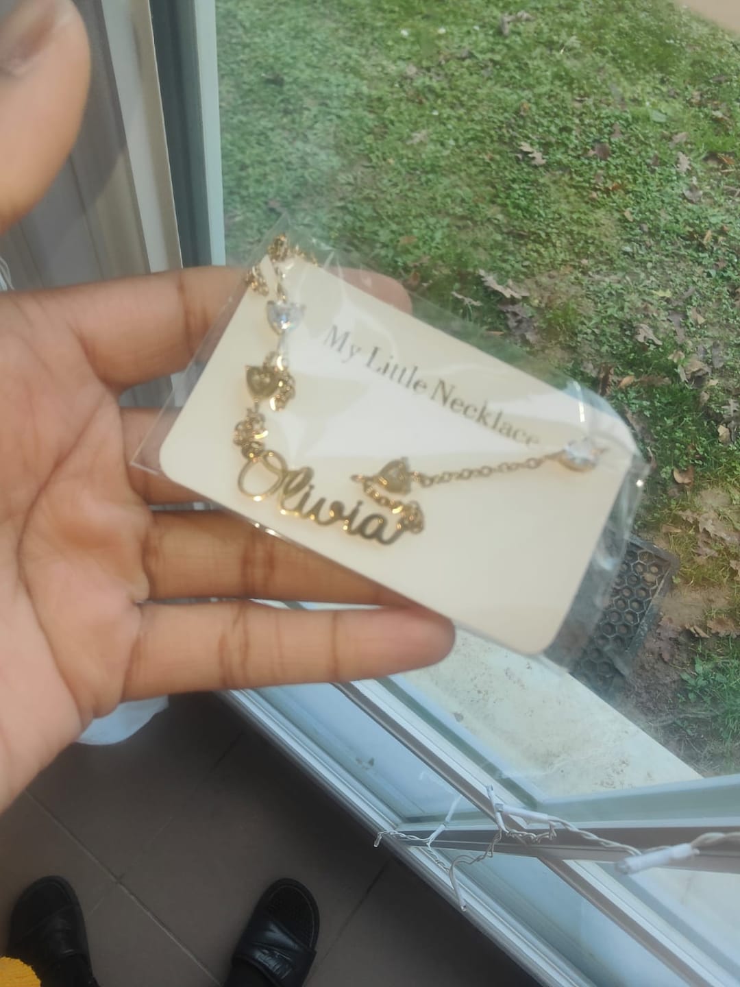 Customer photo review of Collier Cursif avec 4 Coeurs et Pierres