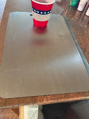 Customer photo review of Taima™ 100% Pure Titanium Cutting Board