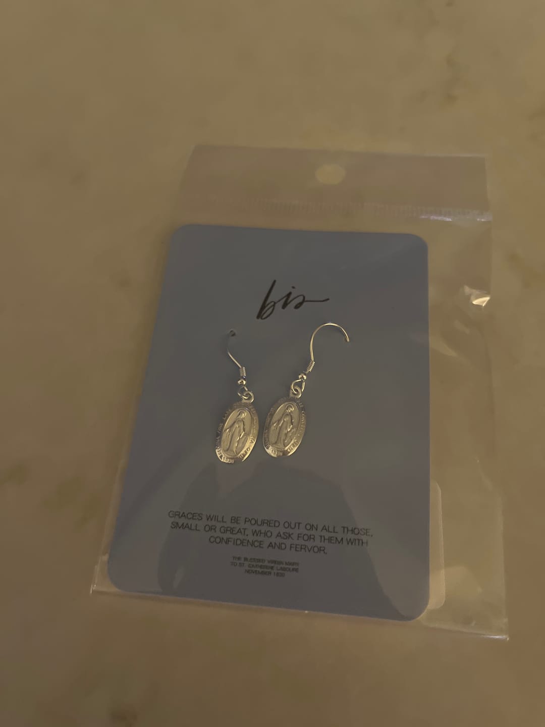 Customer photo review of Miraculous Medal Earrings // Silver