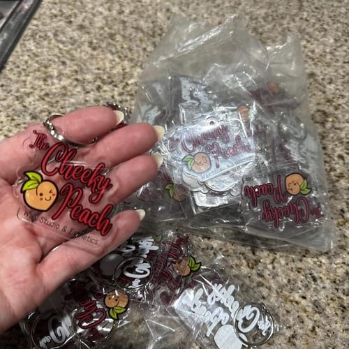 Customer photo review of Customized keychains for businesses