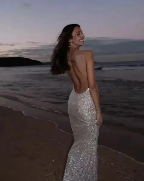 Customer photo review of Sequined Knit Maxi Dress Backless For Evening Party Wear With Glittering Sequin Shine And Satin Finish — Silver | KIMLUD