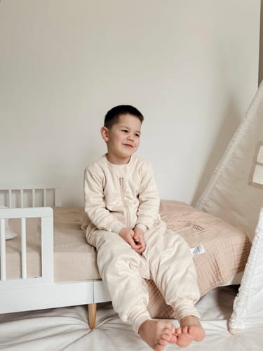 Customer photo review of Organic Cotton & Camel Wool Warm Long Sleeve Sleep Sack With Feet 2.5 TOG - Cream