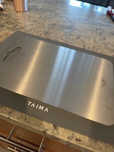 Customer photo review of Taima™ 100% Pure Titanium Cutting Board