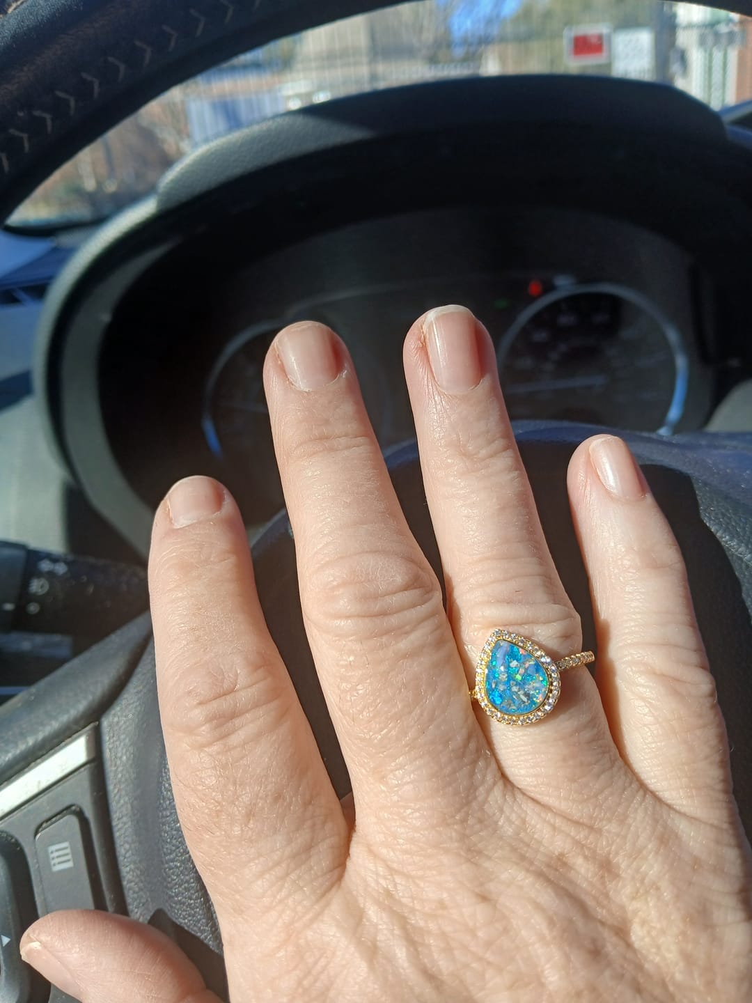 Customer photo review of Bedazzled Pear Opal Ring with Cremation Ashes