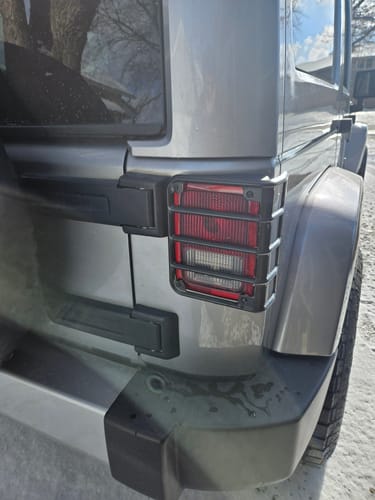 Customer photo review of Aluminum Door Grab Handle Inserts & Black Gas Fuel Tank Cover & Black Euro Tail Light Covers & Glossy Black Clip-in Mesh Grill Inserts Combo for 07-18 Jeep Wrangler JK/JKU