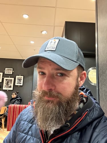 Customer photo review of Trees & Water Trucker Cap