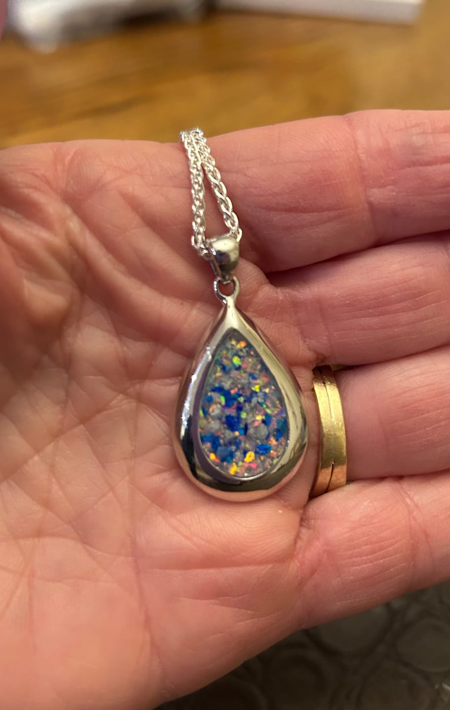 Customer photo review of Pear Drop Opal Cremation Pendant - Engravable