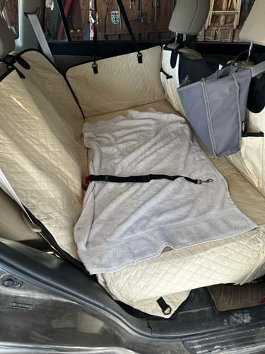 Customer photo review of NEW Waterproof Hard Bottom Car & Truck Seat Foldable Hammock Cover With Storage Pockets, Side Flaps, Headrest Straps, Seat Anchors, & Mesh Window (+FREE SAFETY BELT!)