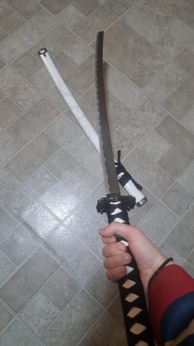 Customer photo review of Japanese Samurai Sword KATANA High Carbon Steel Ninja Blade WHITE Dragon Tang