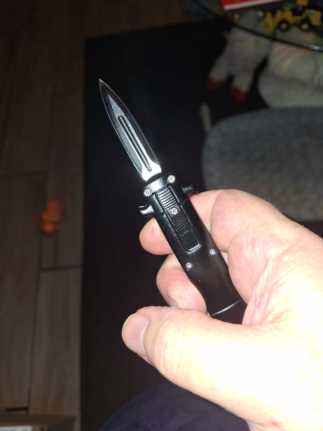 Customer photo review of Black Mini Stiletto OTF Knife Keychain