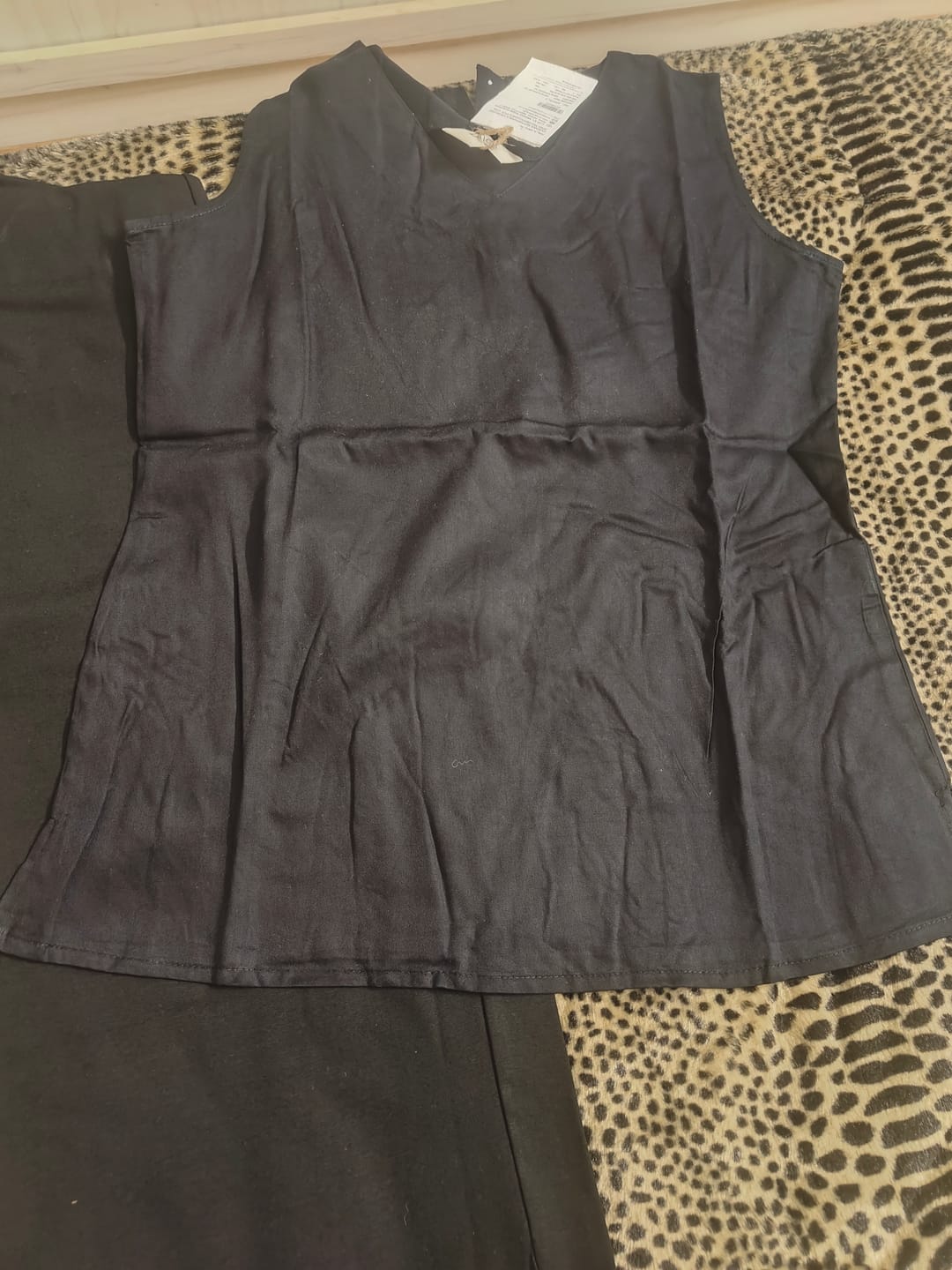 Customer photo review of Black V-Neck Sleeveless Top