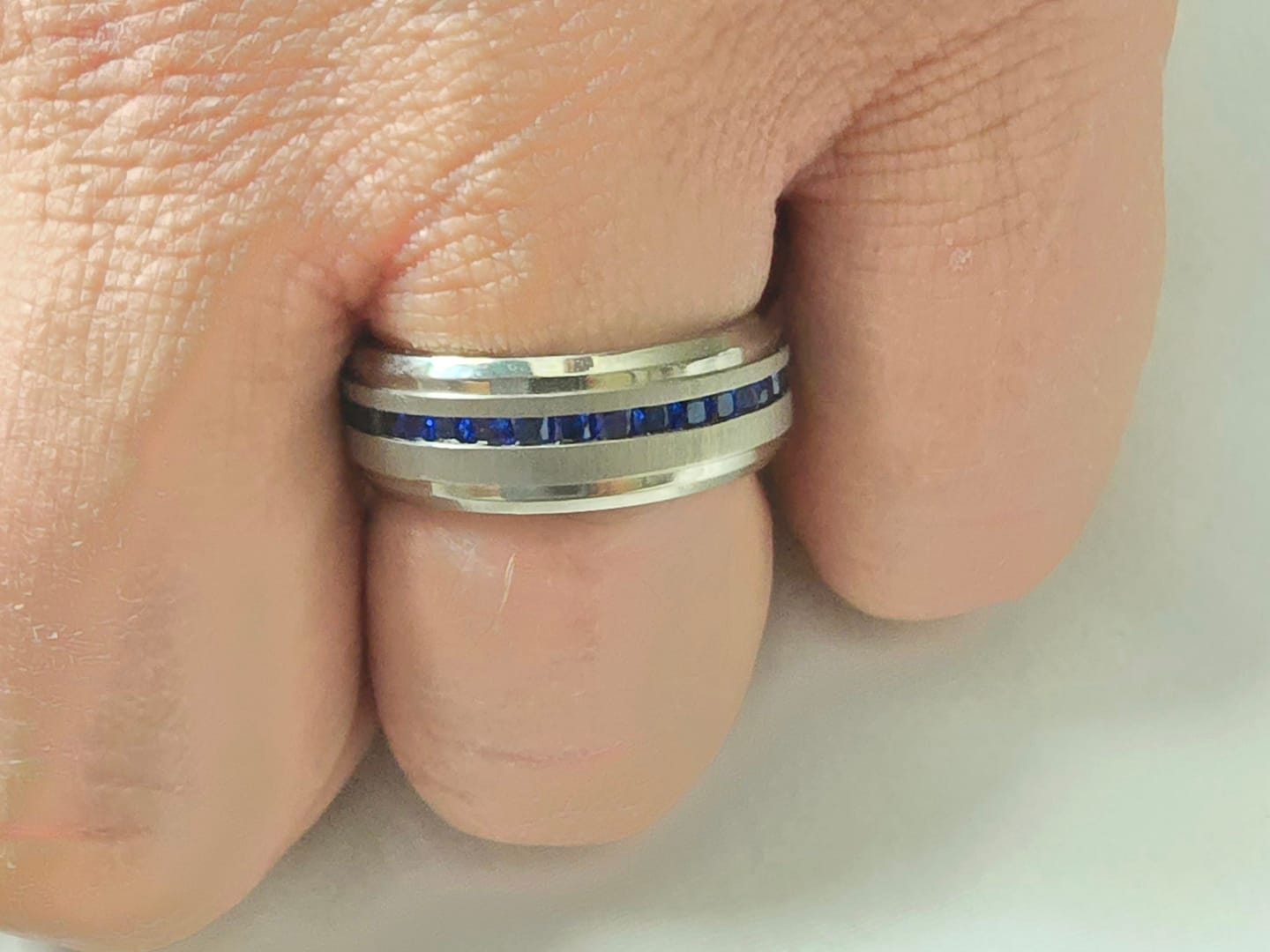 Customer photo review of 8mm - Mens Titanium Wedding Band With Blue Sapphire Titanium Ring
