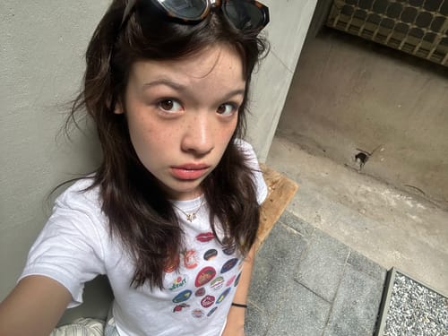 Customer photo review of fruit stickers baby tee