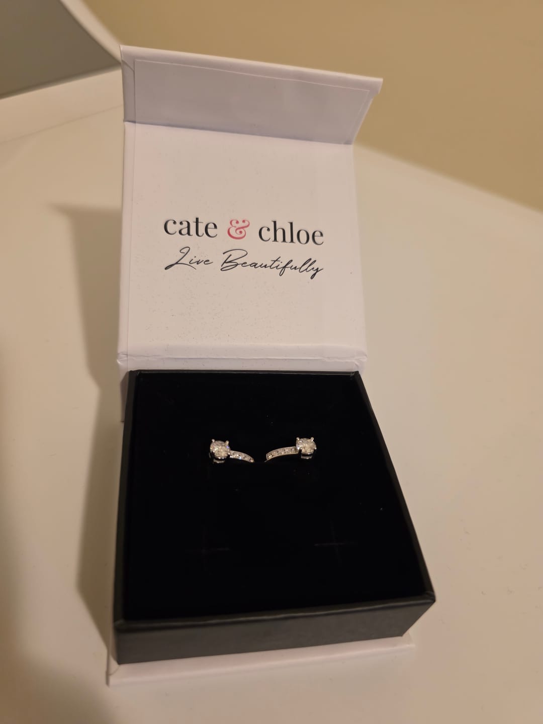 Customer photo review of Moissanite by Cate & Chloe Genesis 18k Gold Plated 925 Sterling Silver Stud Earrings 1.12tcw