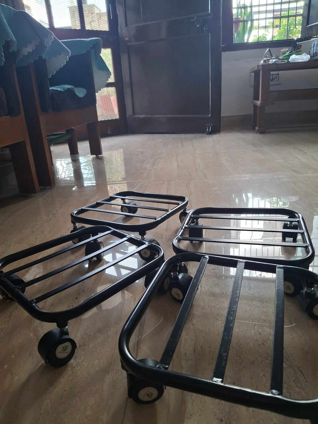 Customer photo review of TryGreen Daze Wheel Rolling Plant Stand for Planters