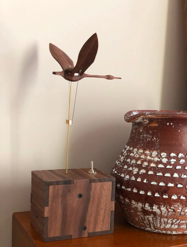Customer photo review of Handcrafted Walnut Swan Automaton — Elegant Motion Art for Desk & Home