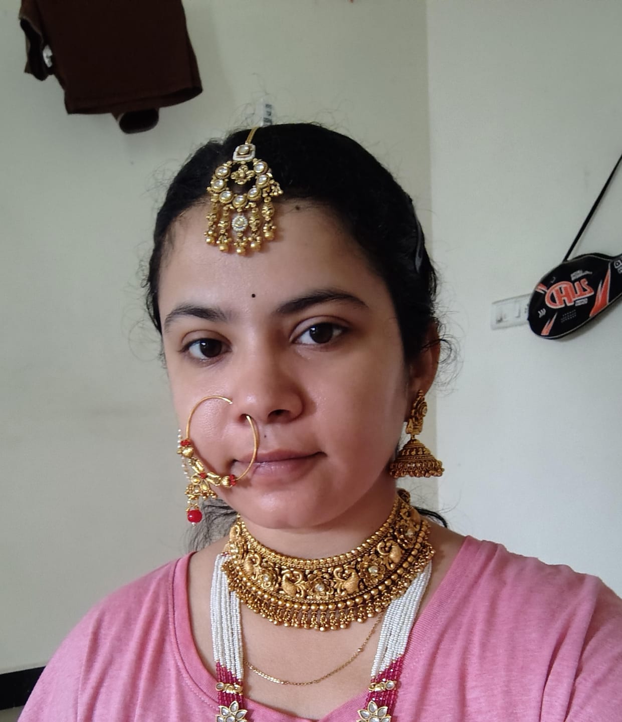 Customer photo review of Intricate peacock and flower design with kundan choker setwith ghunghru hangings