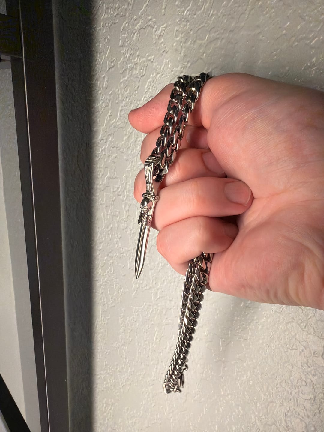 Customer photo review of CATACOMB SWORD PENDANT