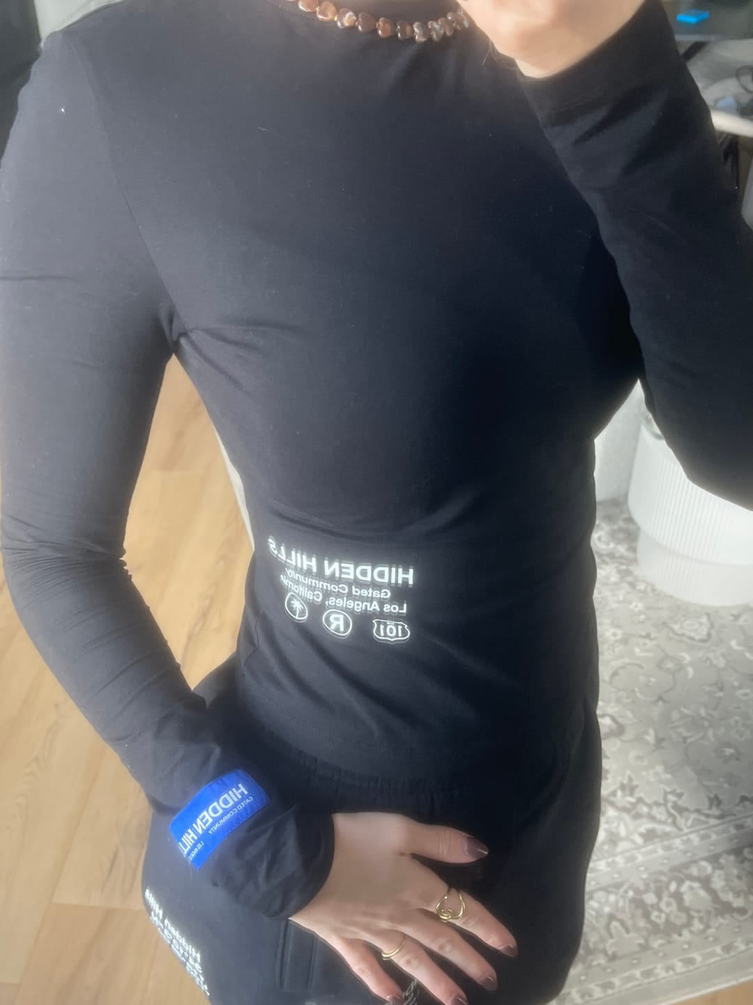 Customer photo review of LABEL LONGSLEEVE TOP BLACK