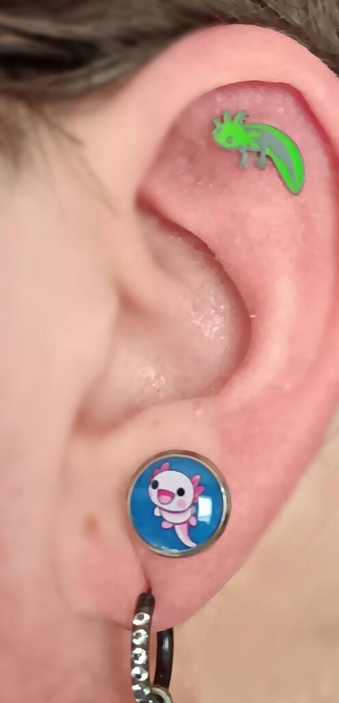 Customer photo review of Glow in the Dark Axolotl Nose Stud + Earring