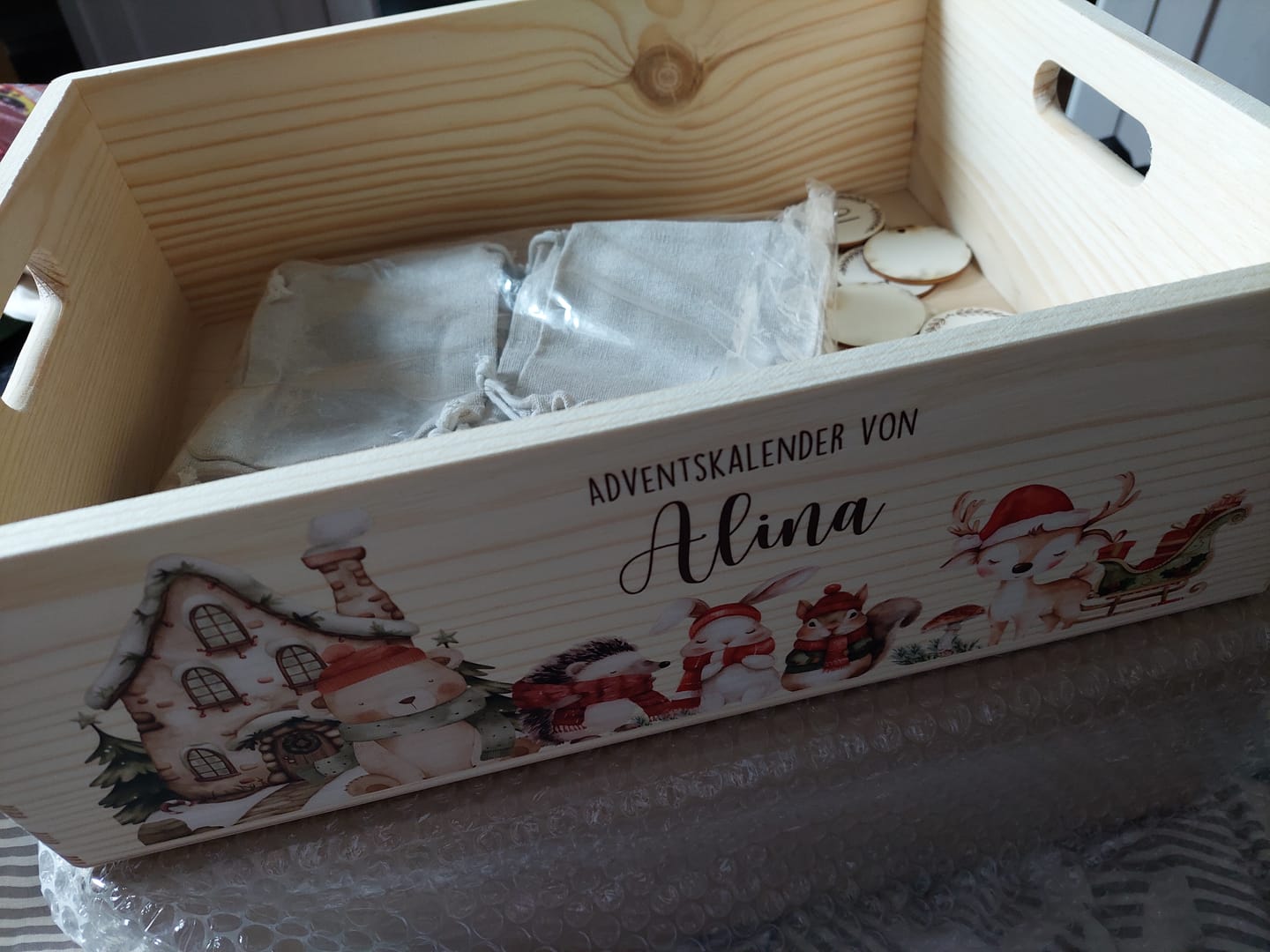 Customer photo review of Adventskalender zum befüllen "Winterdorf mit Tieren" personalisiert