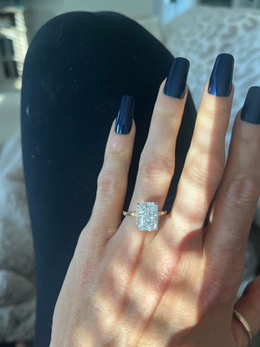 Customer photo review of Louily Exquisite Yellow Gold Crushed Ice Radiant Cut Engagement Ring