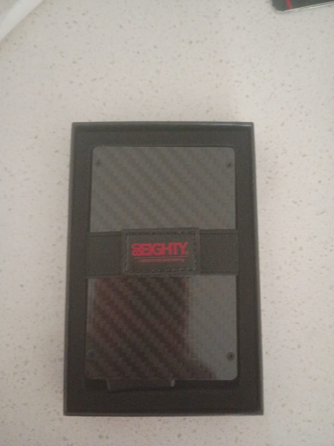 Customer photo review of 80Eighty® Minimalist Carbon Fiber Wallet