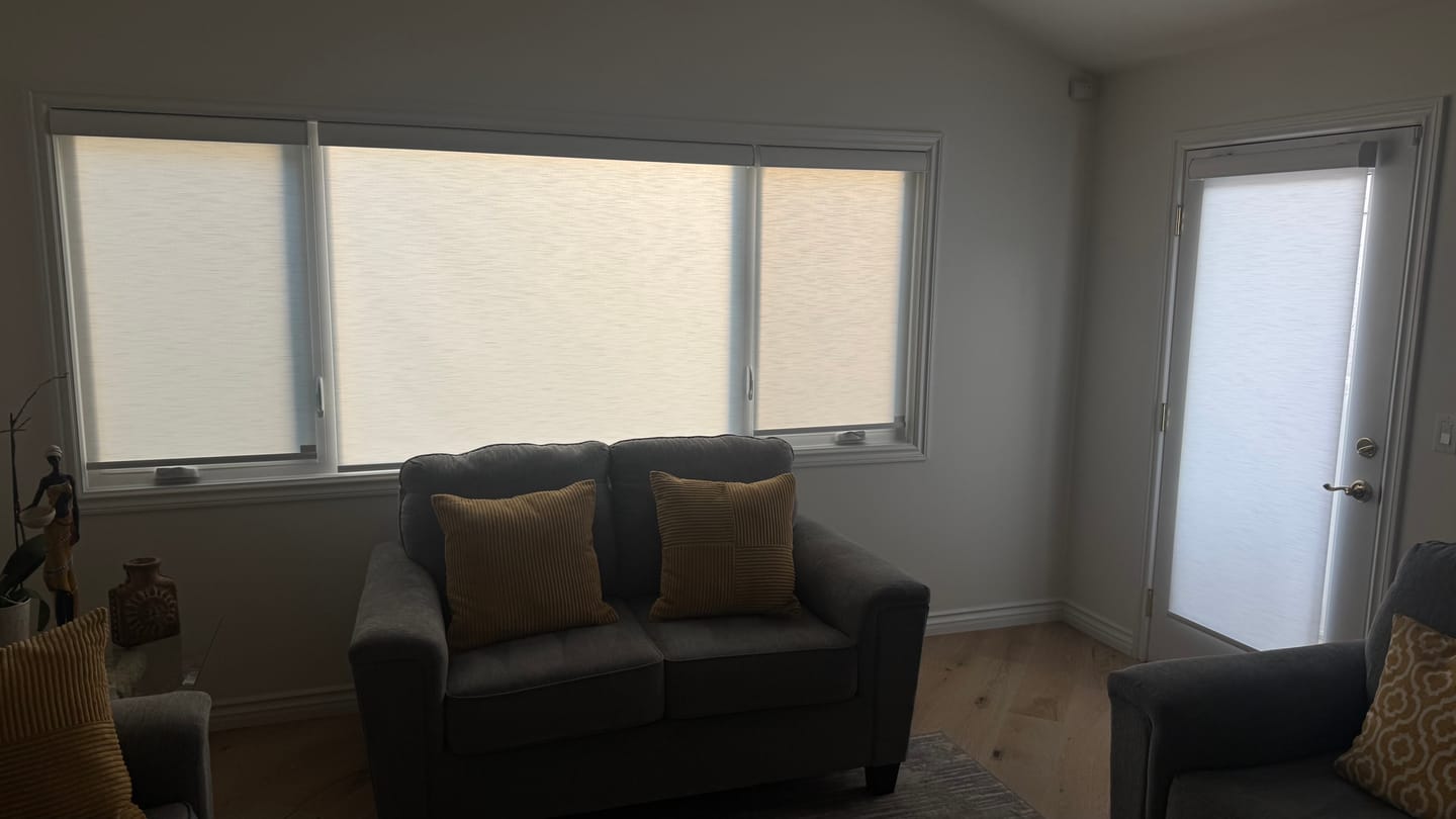 Customer photo review of SmartWings Motorized Light Filtering Roller Shades 70% Blackout Essential