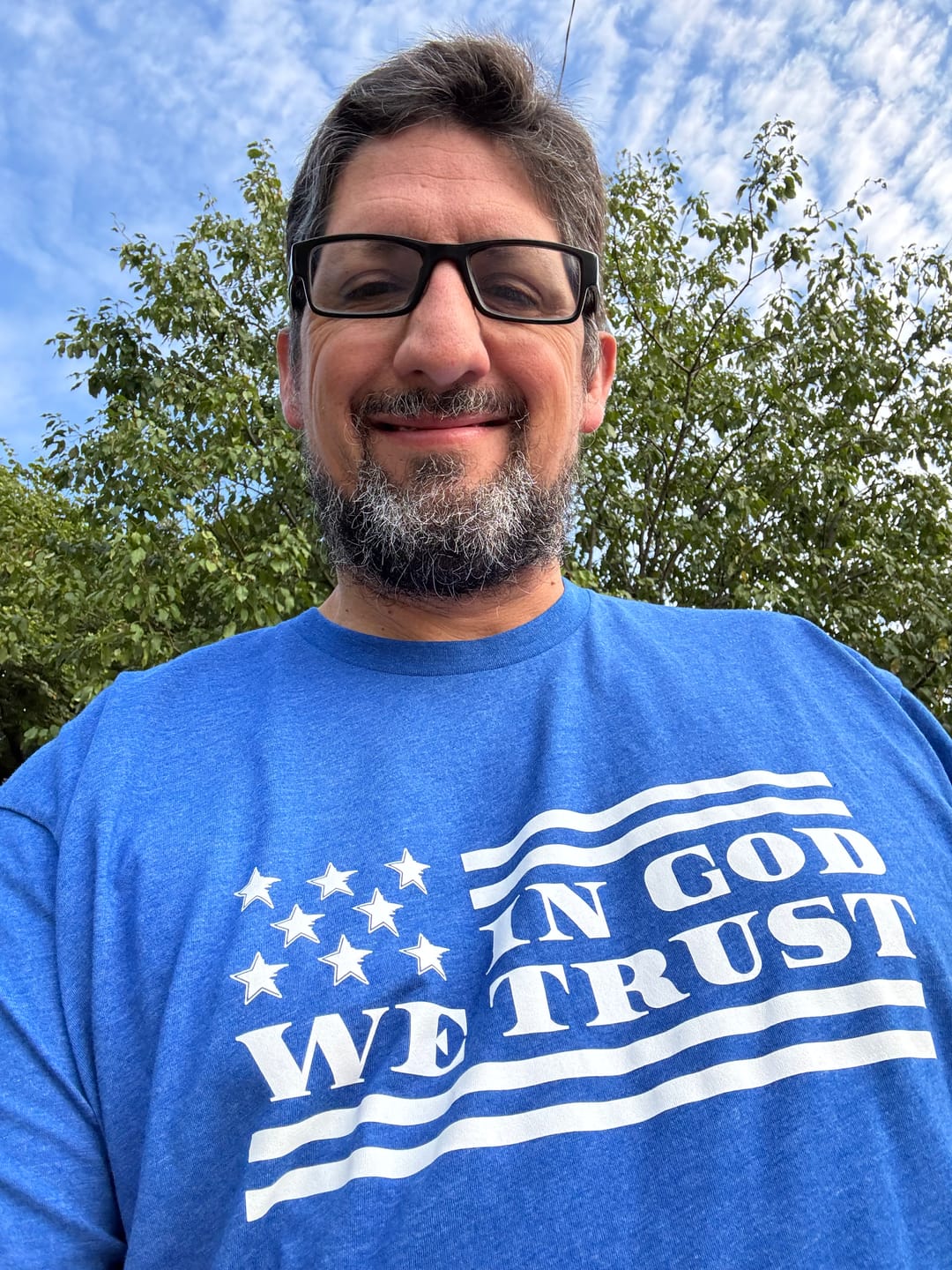 Customer photo review of In God We Trust Tee