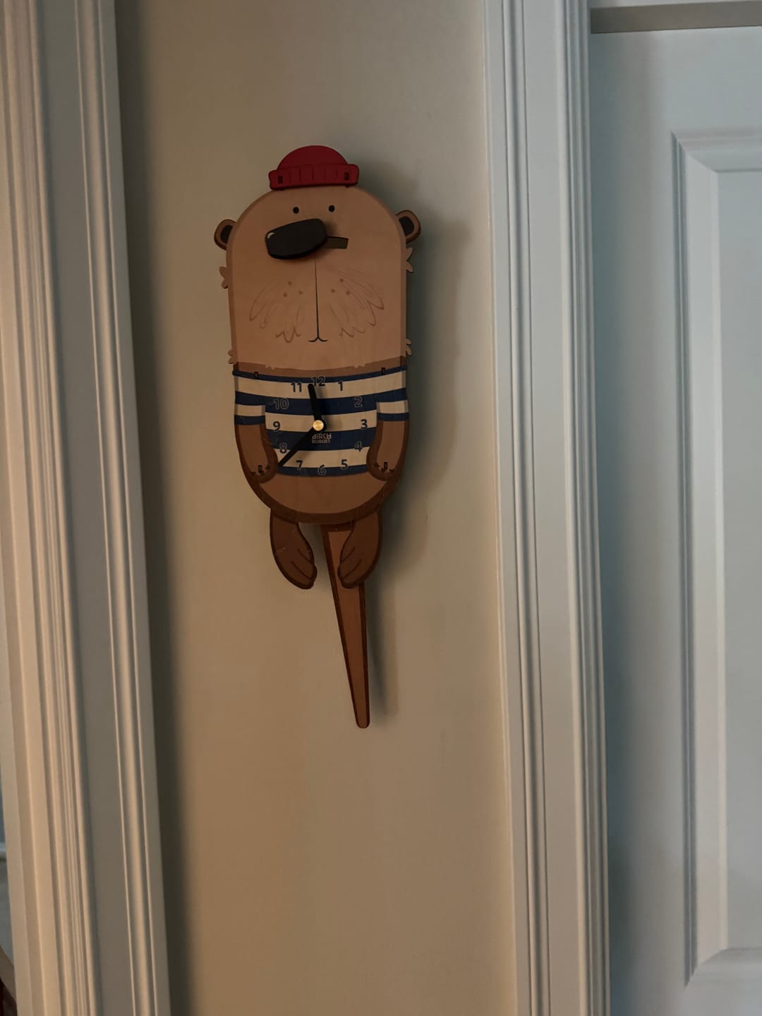 Customer photo review of Waffles the Otter Pendulum Clock