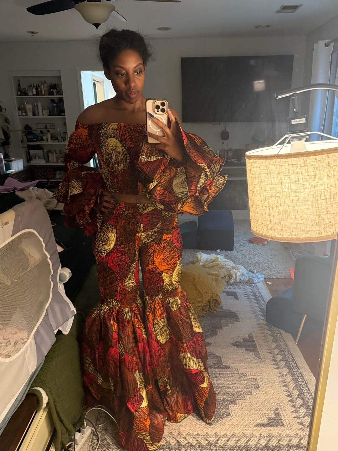 Customer photo review of Kimi Women's African Print Bell Bottom Pants - Red/Brown