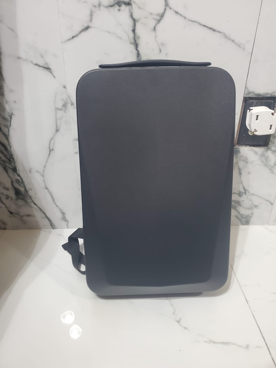 Customer photo review of Tera Tech Armor - Waterproof Hardshell Computer Backpack