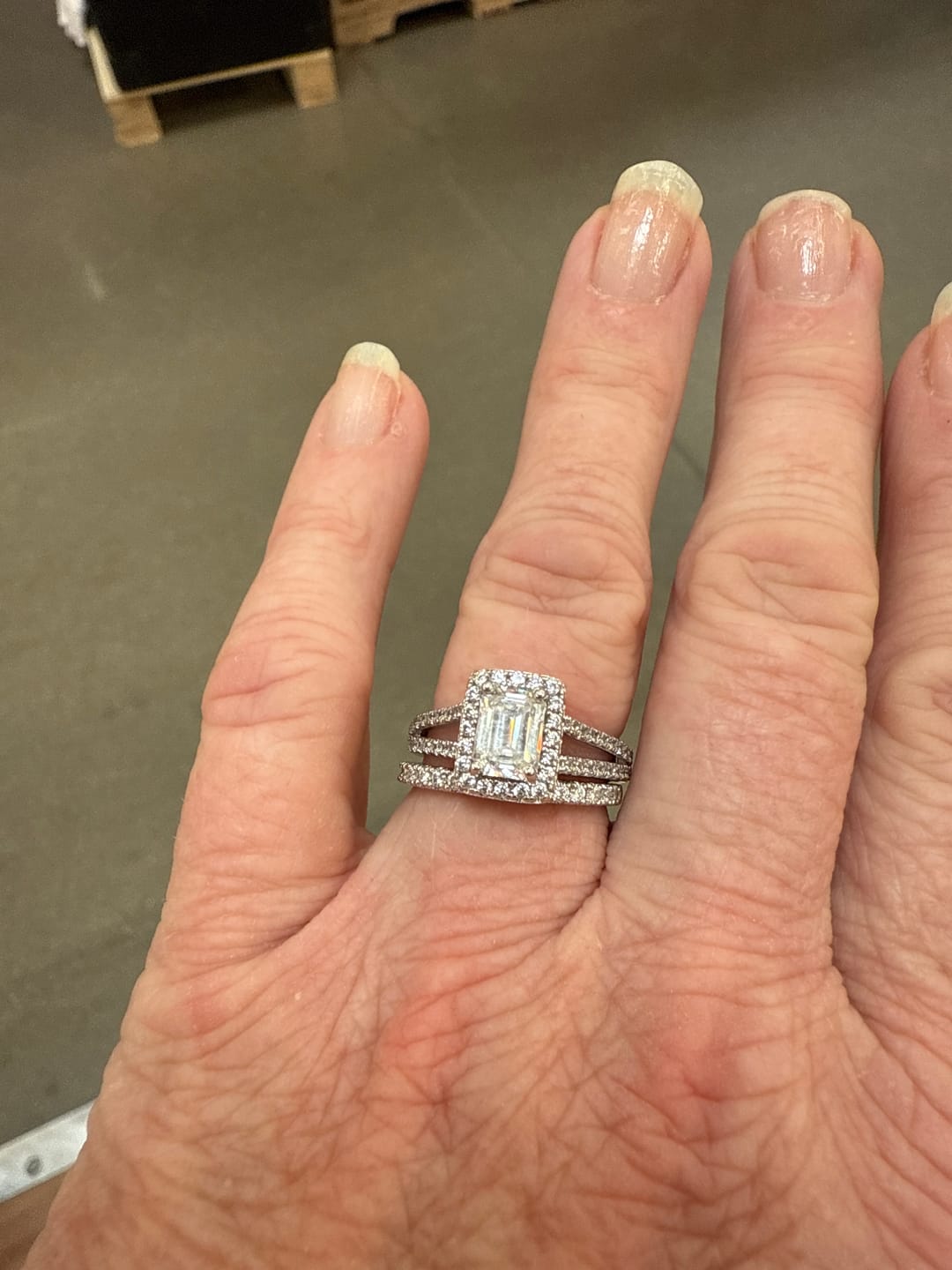 Customer photo review of Halo Emerald Cut Moissanite Split Shank Pave Sterling Silver Engagement Ring