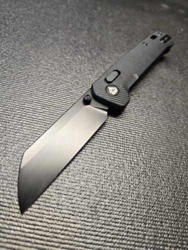 Customer photo review of QSP Penguin Glyde Lock Pocket Knife 14C28N 3.06"