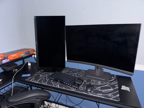 Customer photo review of Black Monochrome Swirl Mousepad