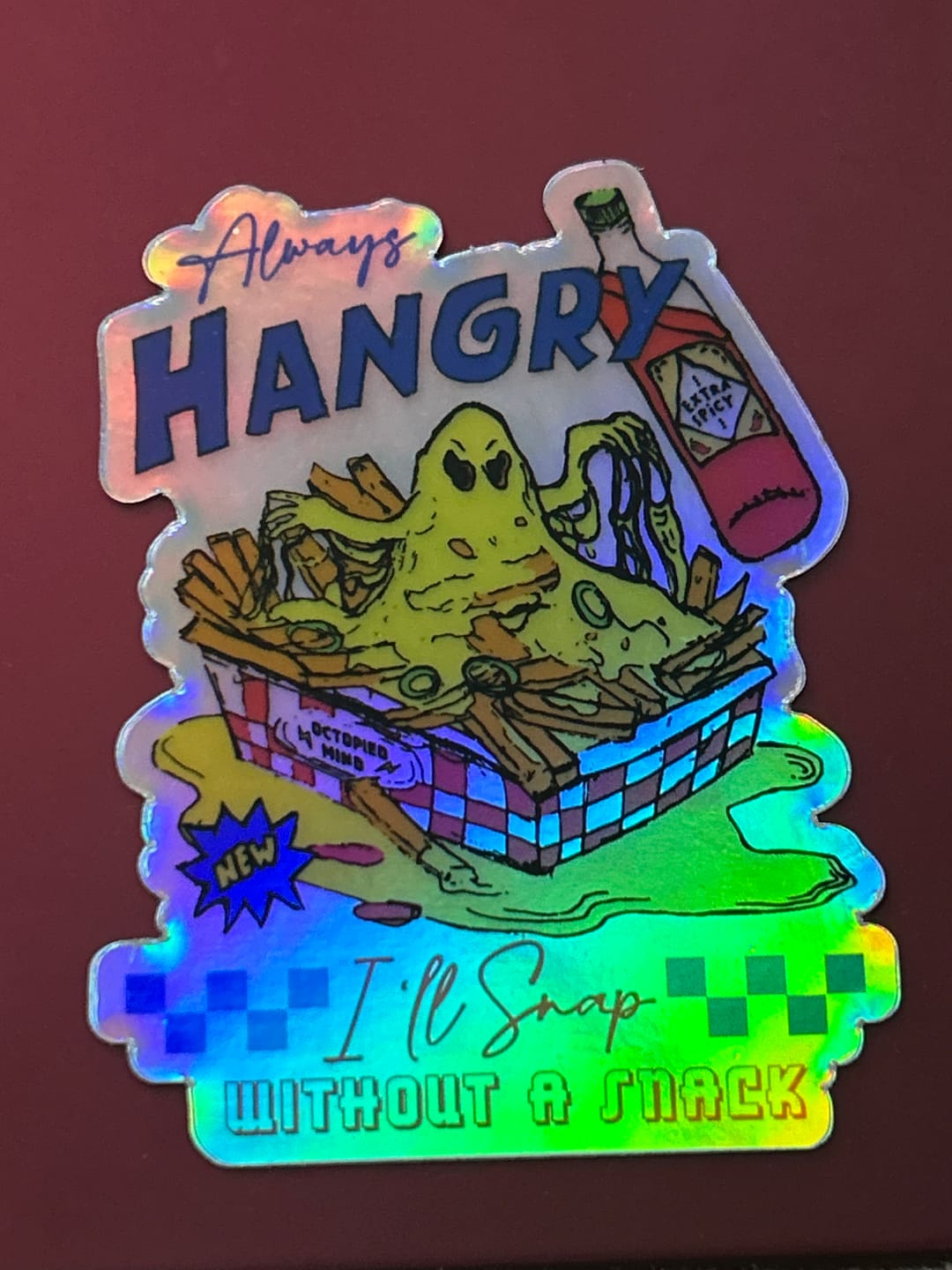 Customer photo review of Always Hangry Holographic Sticker