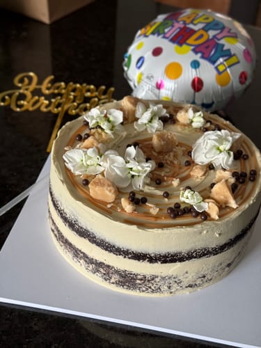 Customer photo review of chocolate caramel cake