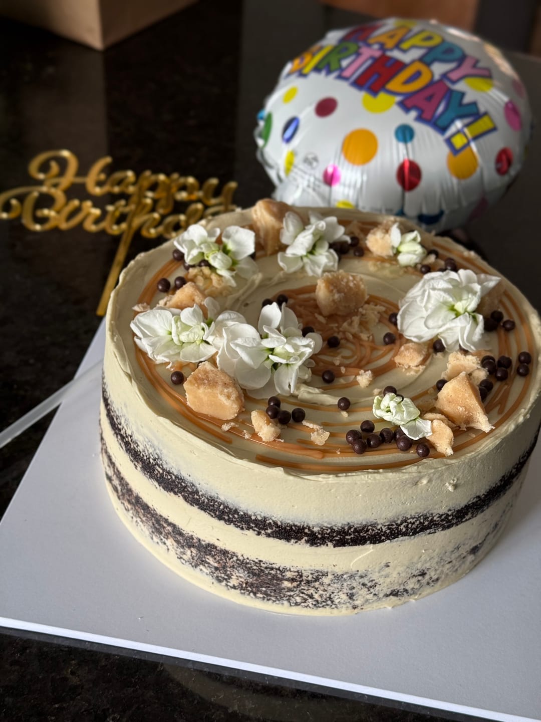 Customer photo review of chocolate caramel cake