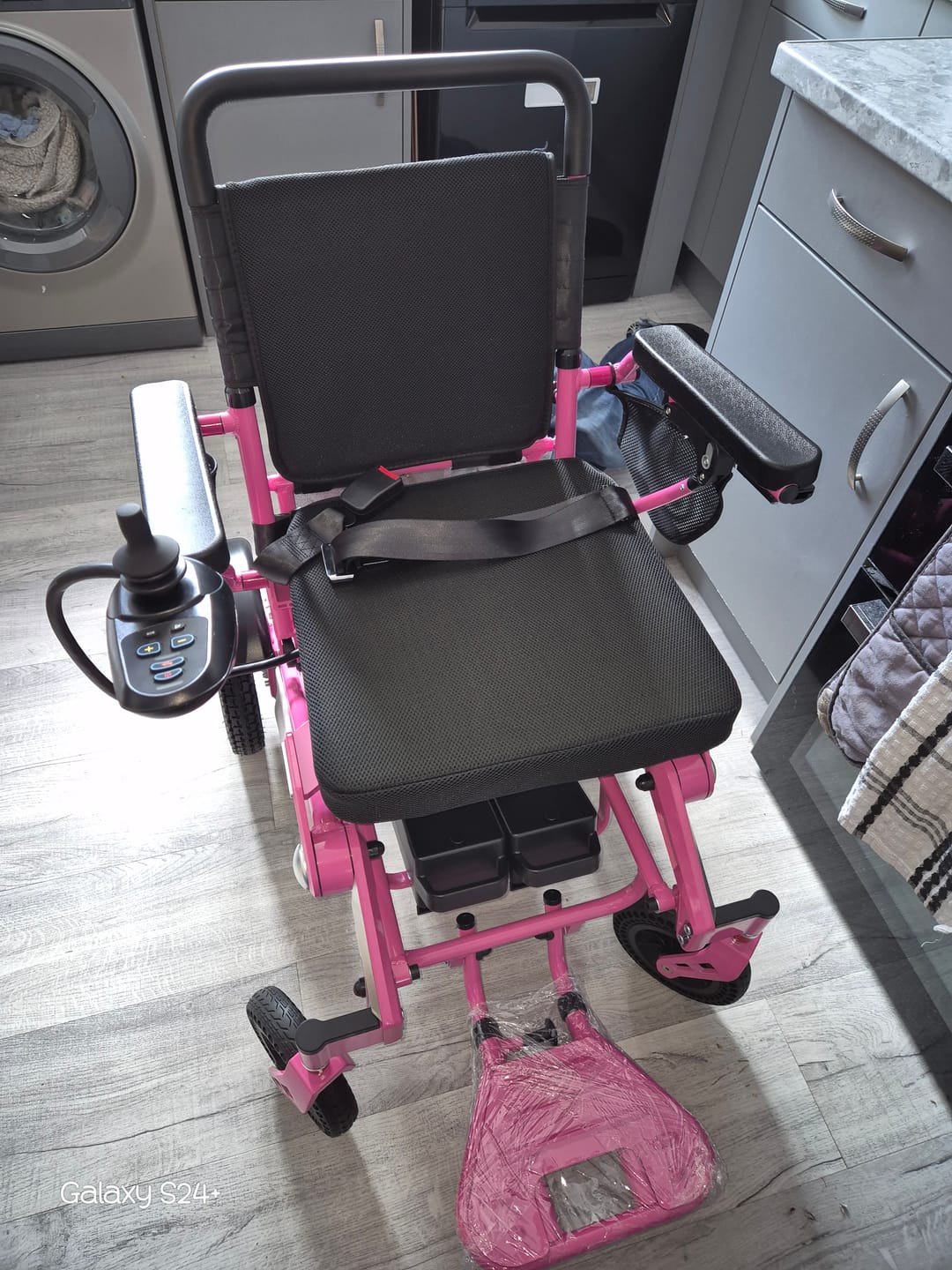 Customer photo review of Limited Edition Pink Lightweight Electric Wheelchair | Freedom Pro ST