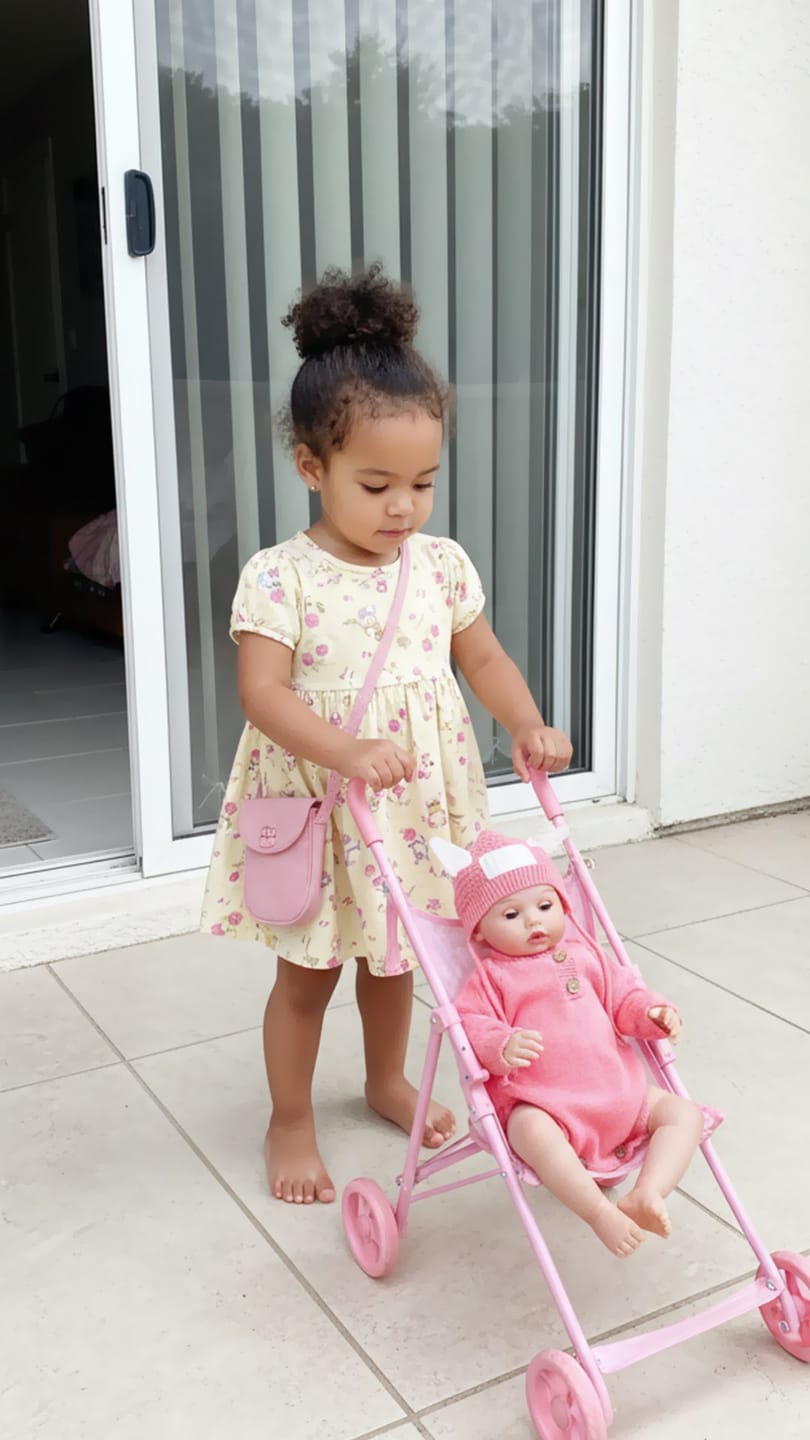 Customer photo review of Interactive Baby Doll – Moves Face While Feeding