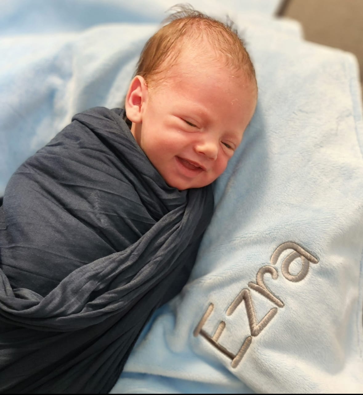 Customer photo review of MinkyBee Stroller Blanket ~ Grey/Navy