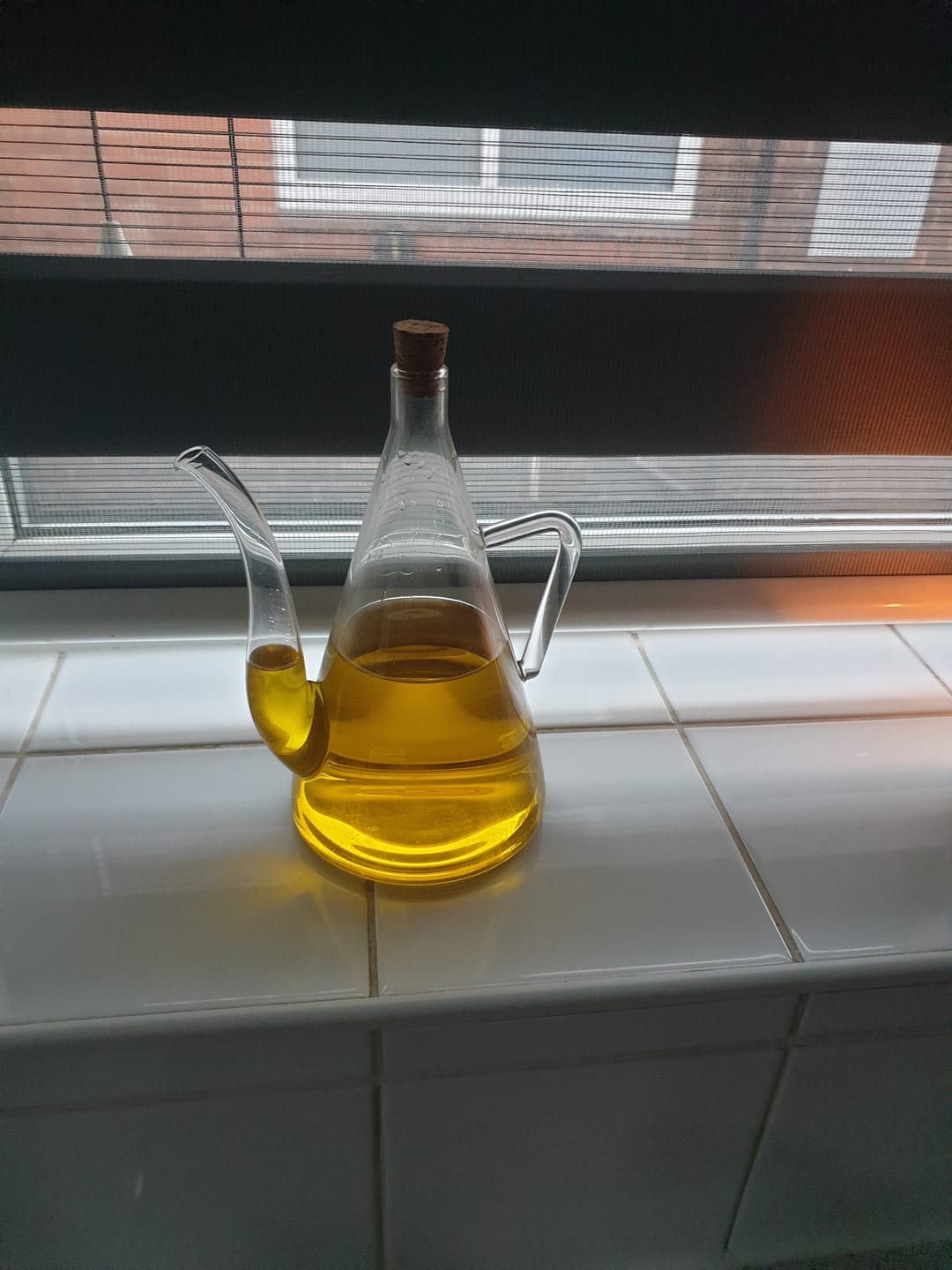 Customer photo review of Clear Glass Oil Pourer with Handle 600ml