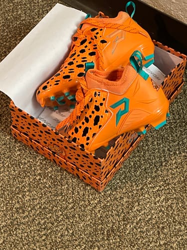 Customer photo review of The Flintstones "Bedrock Blitz" Football Cleats - Quantum Speed by Phenom Elite