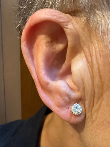Customer photo review of M & Co. 3-Prong Martini Setting Diamond Stud Earrings