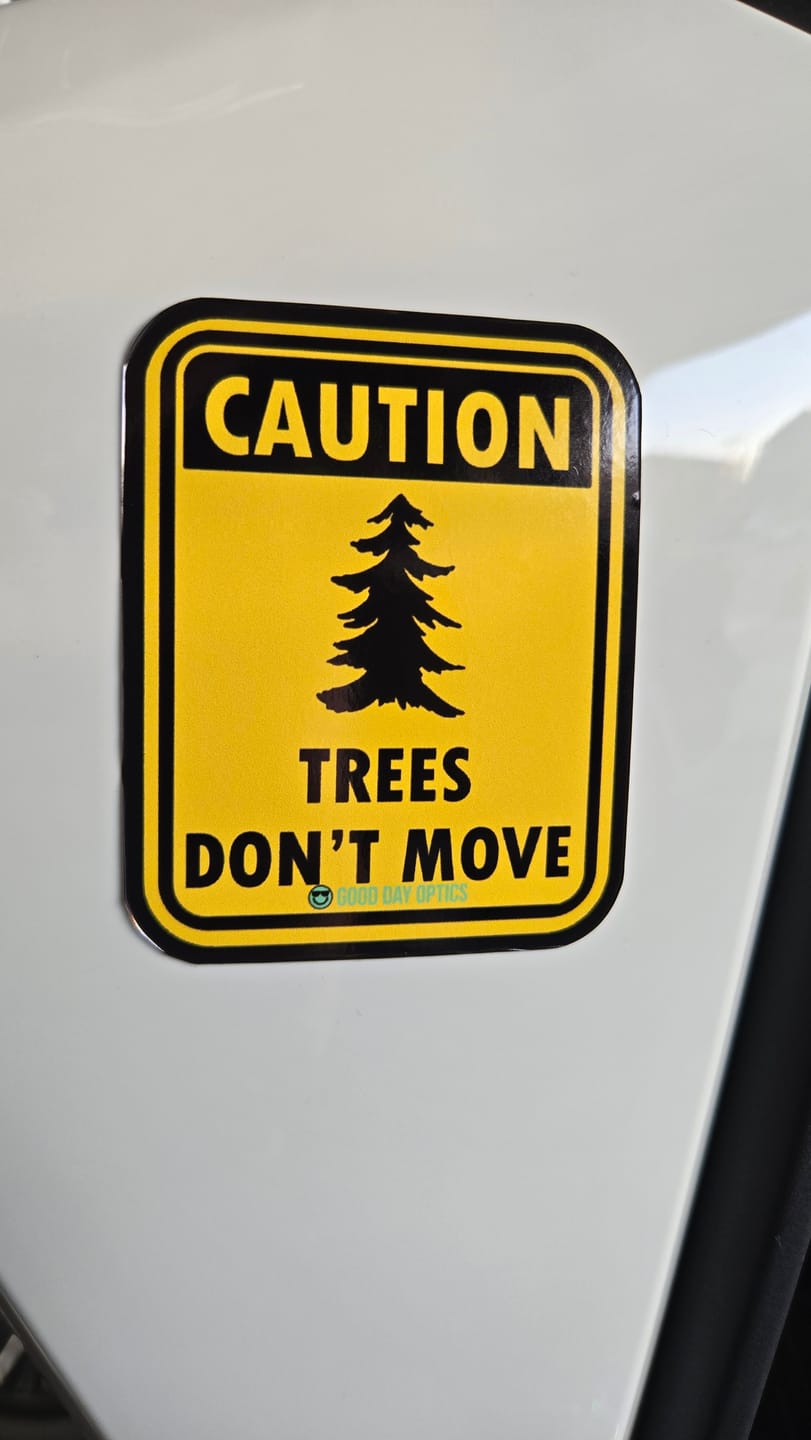 Customer photo review of Trees Don’t Move Sticker