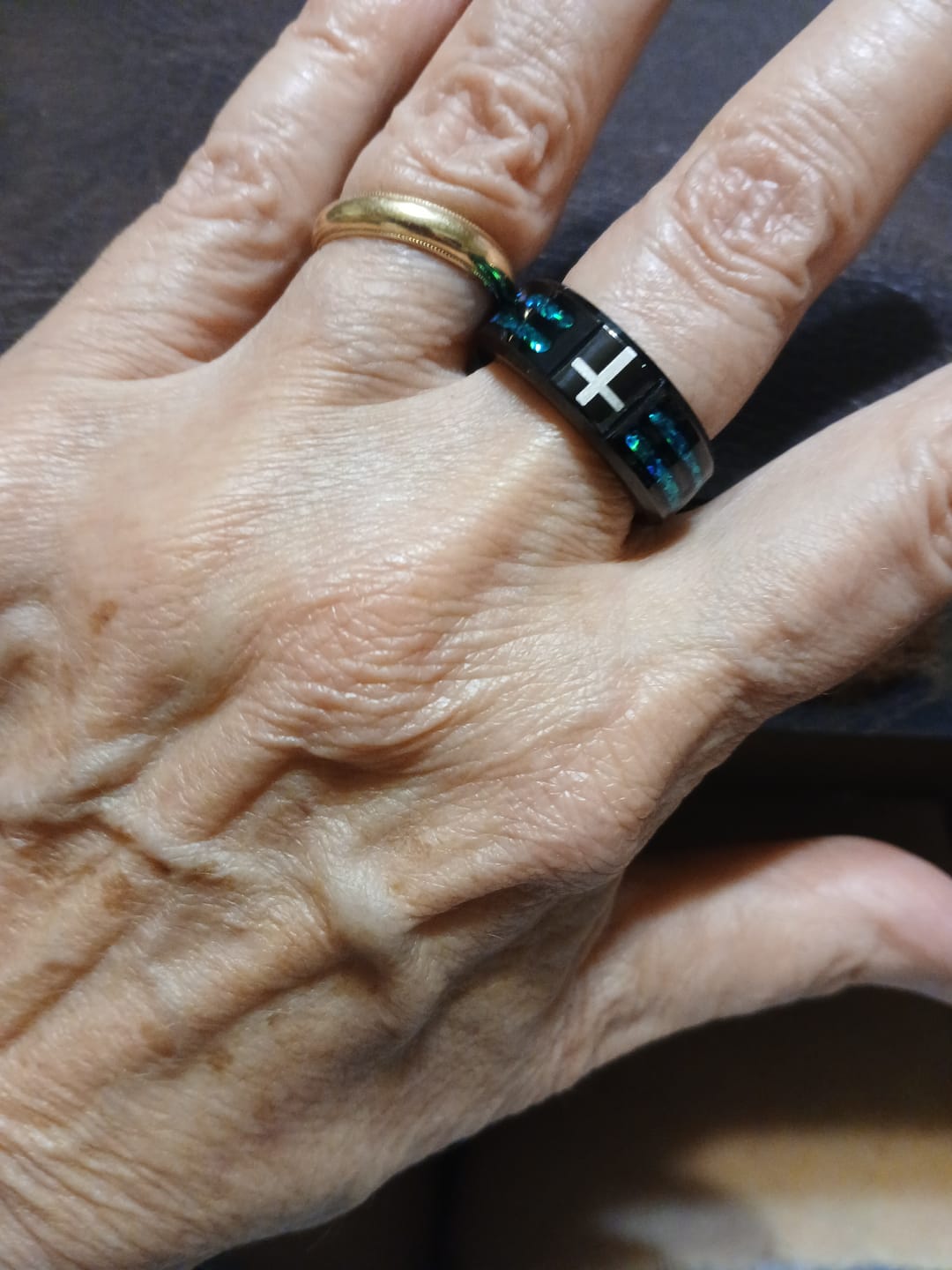Customer photo review of Christianartworkshop Modern Titanium Steel Cross Ring with Laser Blue Inlay: Serenity in Christ's Blue Light